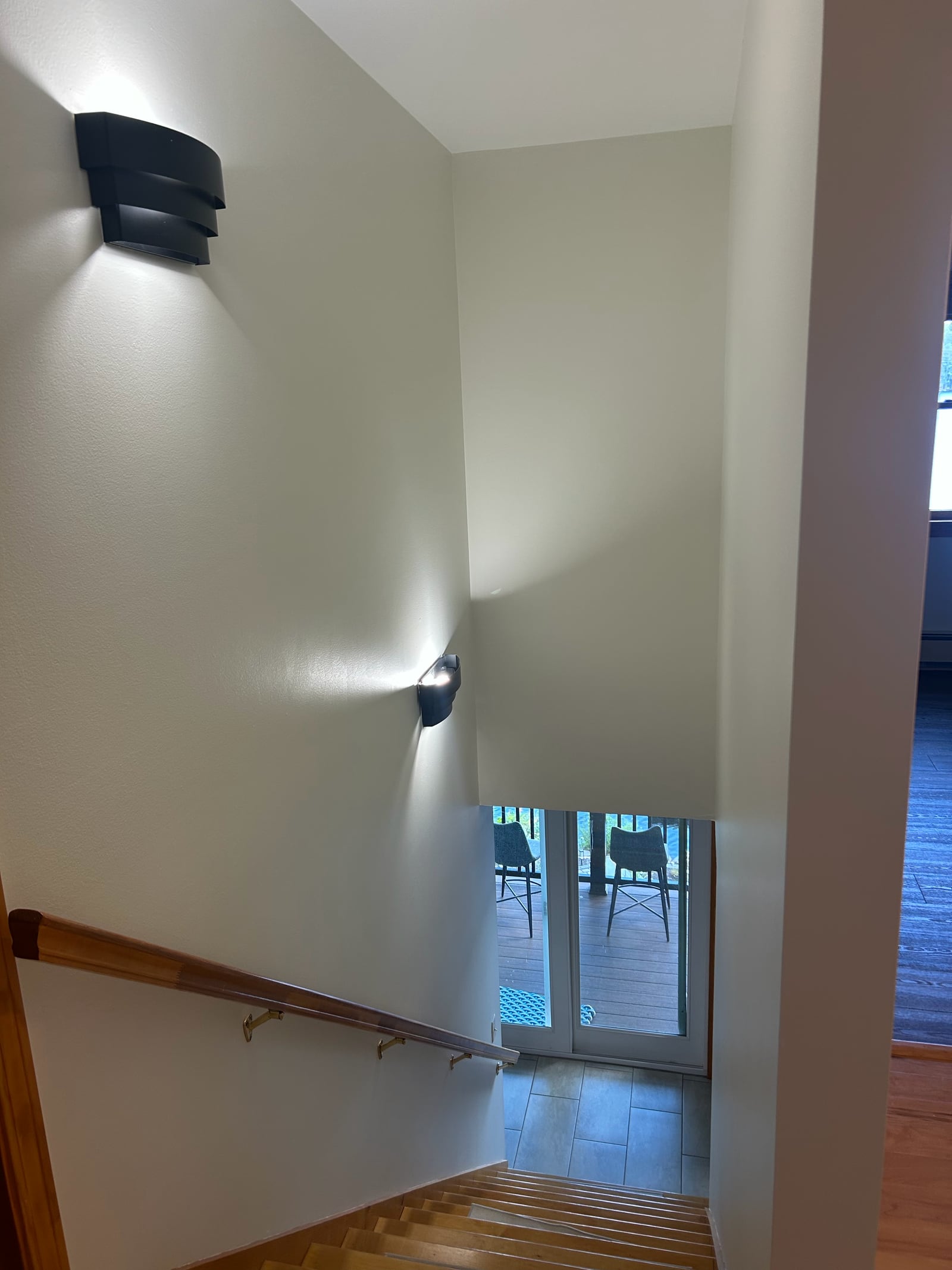 Painted stairwell viewed from the upper landing